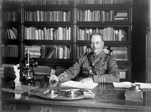 view Portrait of Sir Ronald Ross at his desk