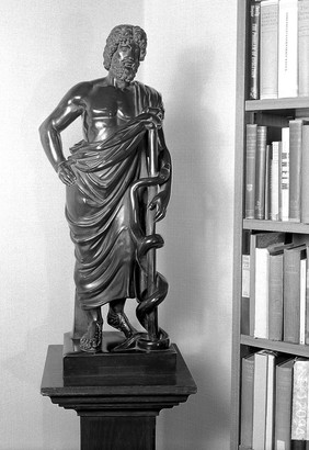 Statuette of Aesculapius, holding caduceus.