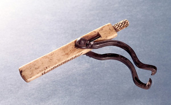 Single-ended pelican with ivory handle.