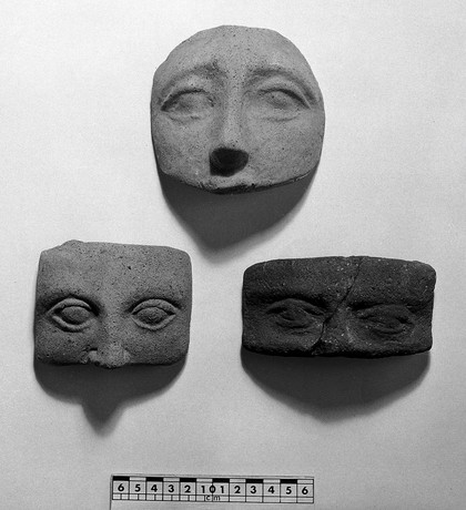 Votive offerings in the form of the eyes. Apparently made of terracotta.