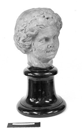 Head of sculpted woman, Greek/Roman