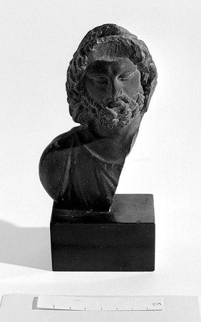 Head of Aesculapius with hollowed back