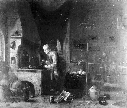 An alchemist in his laboratory. Oil painting by a follower of David Teniers the younger.