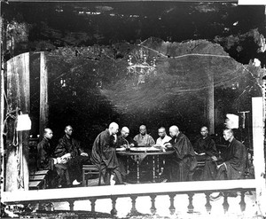 view Buddhist monks playing a board game, Canton, Kwangtung province, China.