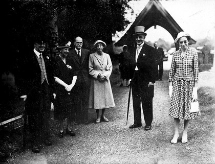 Group portrait with l. to r., Sir H. Dale and Lady Dale, Edgar Hope Simpson, Elinor Mary (younger daughter of Sir H. Dale), Sir William Arthur Stanier (d. 1965) and his daughter, Joan; at wedding of Patricia Lewis and Sinclair Watson