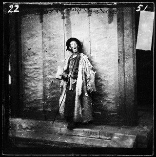 Peking, Pechili province, China: a nightwatchman. Photograph, 1981, from a negative by John Thomson, 1869.