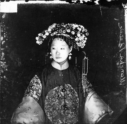 China: a Manchu bride. Photograph, 1981, from a negative by John Thomson, 1871.