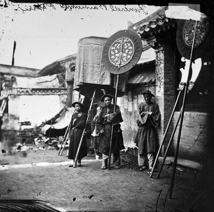 Hired bannermen partaking in a funeral procession.