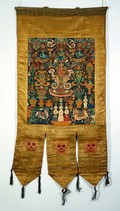 view Attributes of rDo-rje Kon-btsun De-mo in a "rgyan tshogs" banner. Distemper painting by a Tibetan painter.