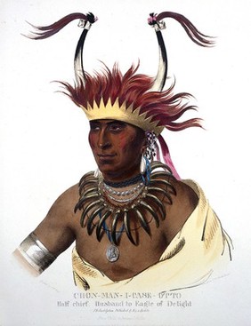 Shaumonekusse, a chief of the Oto (Otoe) tribe, wearing a crown hair piece with horns, a bear-claw necklace and a medallion. Colour lithograph by C. G. Childs after C. B. King, 1833.