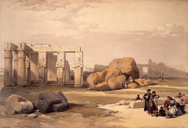 Fragments of the large statues of Memnon (Pharaoh Amenhotep III) at the Memnonium, Thebes, Egypt. Coloured lithograph by Louis Haghe after David Roberts, 1847.
