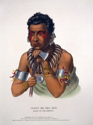Ma-hos-kah (White Cloud) the Younger, a chief of the Iowa tribe, leaning on a tomahawk. Coloured lithograph by J.T. Bowen after C. B. King, 1838.