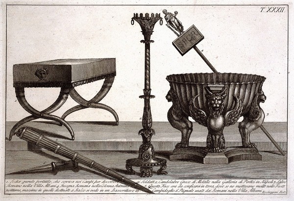 A curule chair, a Greek metal candelabra, a bowl supported by sphinxes, a Roman standard, a clay torch and a Roman dagger. Etching by L. Roccheggiani, ca. 1811.