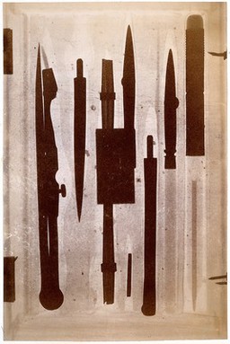 Drawing instruments (compasses, pencils) inside a case: radiograph from outside the case. Photograph by Sir Gervas Powell Glyn, 6th Bart., ca. 1896.
