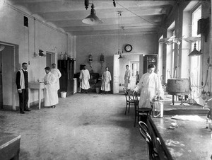 view Seven members of staff in the pre-operative room in the physiology department, Imperial Institute of Experimental Medicine, St Petersburg. Photograph, 1904.