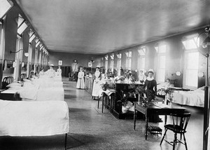 view Royal Portsmouth Hospital: York Ward, with nurses and patients. Photograph, 1902.