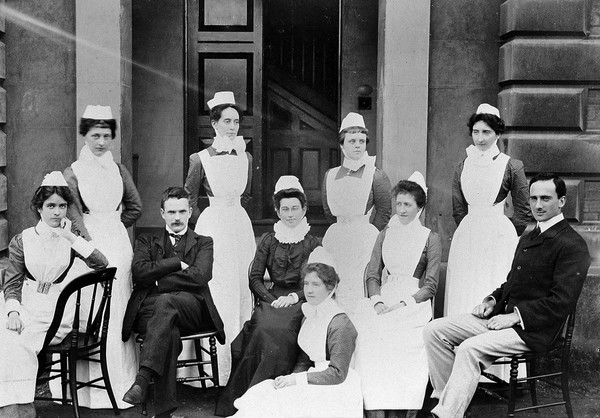 Royal Portsmouth Hospital: House surgeons, Matron and nurses. Photograph, 1902.