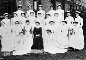 view Royal Portsmouth Hospital: Matron, Assistant Matron, and nurses. Photograph, 1902.