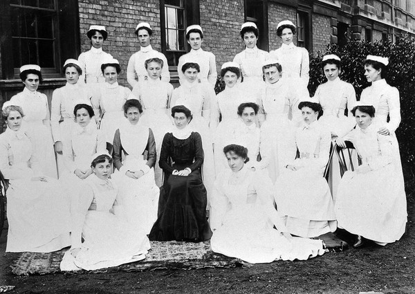 Royal Portsmouth Hospital: Matron, Assistant Matron, and nurses. Photograph, 1902.