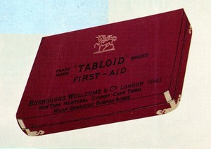 view "Tabloid" Brand red first aid box.