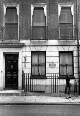 John Snow: his residence at 18 Sackville Street, London, showing the plaque in his honour. Photograph.