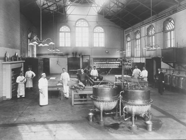 Claybury Asylum, Woodford, Essex: a kitchen. Photograph by the London & County Photographic Co., [1893?].