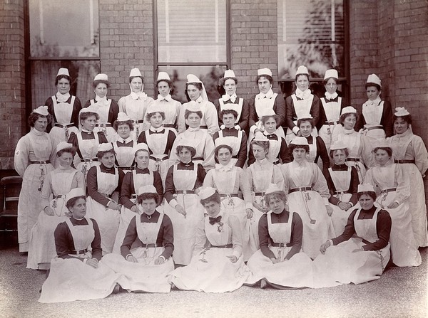 Claybury Asylum, Woodford, Essex: thirty-four nurses. Photograph by the London & County Photographic Co., [1893?].