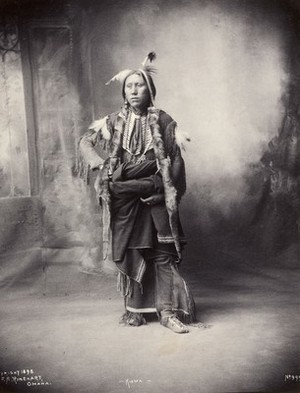 view An American of the Kiowa tribe. Platinum print by F.A. Rinehart, 1898.