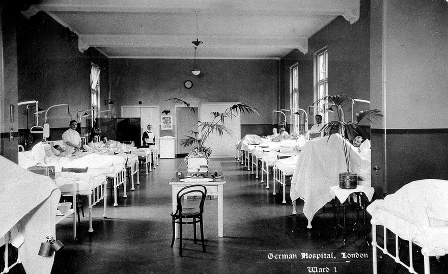 The German Hospital, Dalston: a ward with patients and a nurse. Photograph by Marshall, Keene & Co.