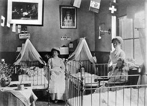 view Hahnemann Hospital and Homœopathic Dispensaries, Liverpool: a children's ward, decorated with flags possibly for the coronation of King George V. Photograph.