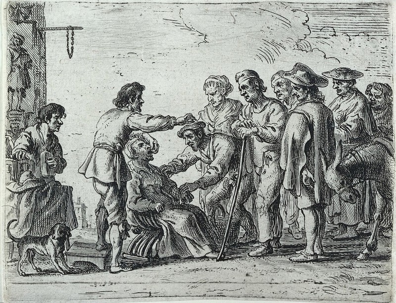 A travelling healer demonstrating the extraction of a tooth from the mouth of a woman patient, before a crowd of onlookers. Etching attributed to Cornelis de Wael., 1600-1699, by Cornelis de Wael