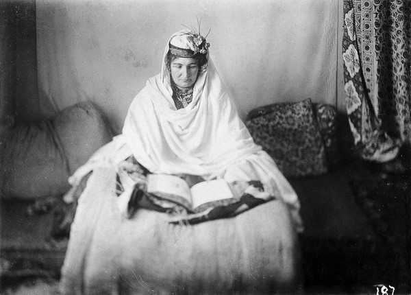 A Lady of the royal harem reading the Koran, Kabul