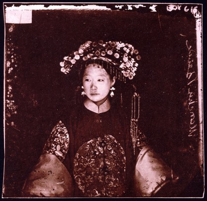 China: a Manchu bride. Photograph, 1981, from a negative by John Thomson, 1871.