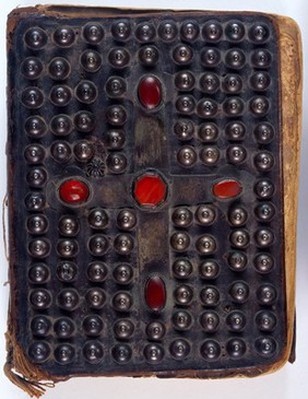 The Four Gospels, 1495, dark brown leather over boards with silver ornaments and a cross studded with five comelian stones