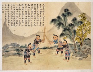 view Hei Miao. Four men of the Hei Miao (Black Miao) tribe playing the mouth-organ.