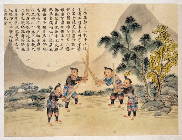 Hei Miao. Four men of the Hei Miao (Black Miao) tribe playing the mouth-organ.