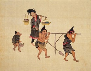 view Hong Miao. A woman and a boy, from the Hong Miao (Red Miao) tribe, carrying food while two men are probably on their way to the fields