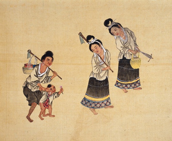 Madeng longjia Maio. Two women and one man with a child, of the Madeng ('Stirr-up') Miao tribe, on their way to the fields. The woman's hairdress accounts for the name of 'Stirr-up Miao'