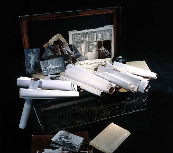 A metal and timber box (chest, trunk), once the property of E N Fallaize, used to house his photographic collection. Construction and assembly by H. Davies and sons, 1916.