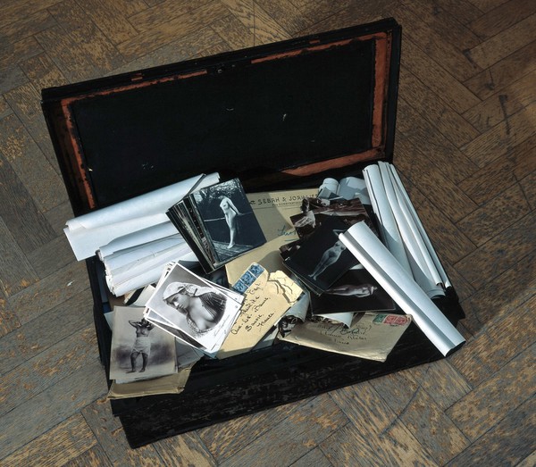 A metal and timber box (chest, trunk), once the property of E N Fallaize, used to house his photographic collection. Construction and assembly by H. Davies and sons, 1916.