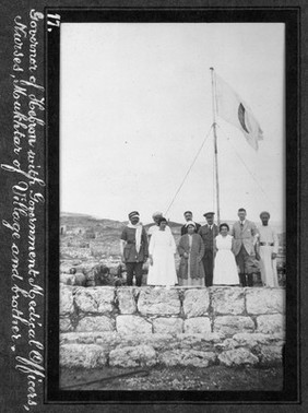 Smallpox epidemic, Palestine: officials of the Government and of a village. Photograph, 1922.