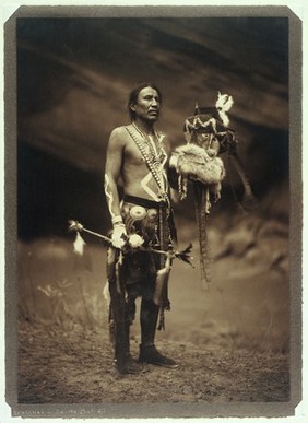 A Navajo man in ceremonial dress representing the Yebichai god Zahabolzi (Zahadolzha?). Photograph by Edward S. Curtis, 1904.