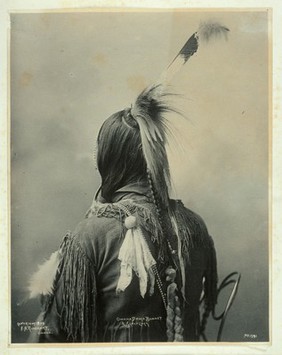 The back of an Omaha Indian. Platinum print by F.A. Rinehart, 1899.
