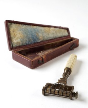 An English scarificator with six lancets used for blood-letting made by Fuller of London