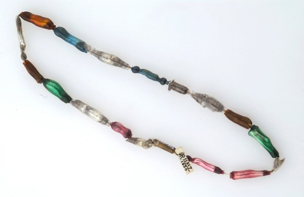 An amuletic necklace worn to cure sore throats, London.