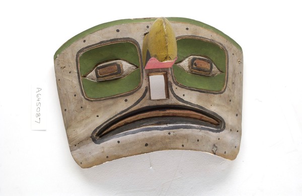 Shaman's mask with human features and a removable bird's beak. Haida people, Queen Charlotte Islands, British Columbia, Canada