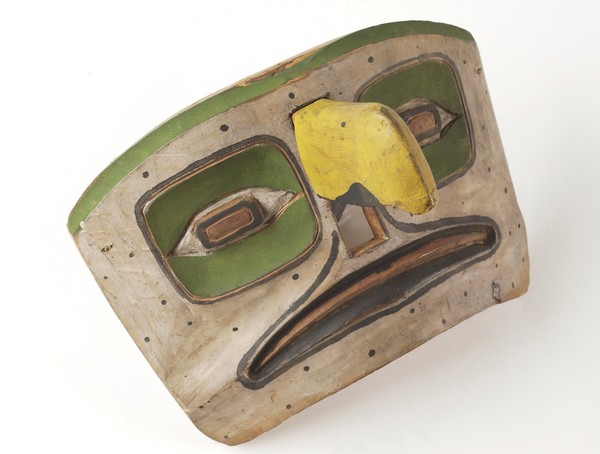 Shaman's mask with human features and a removable bird's beak. Haida people, Queen Charlotte Islands, British Columbia, Canada