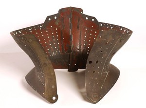 view A brass corset used to minimise the waist or as an orthopedic device to support the back or correct a spinal deformity. Probably English