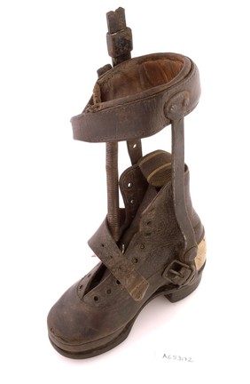 A Victorian child's shoe and leg caliper in leather and steel