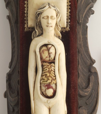 Ivory anatomical model of a pregnant female with removable parts possibly used by obstetric specialists or midwives to provide reassurance for pregnant women. Possibly German